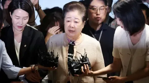 Disputed Church Figure Rejects Gift-giving Allegations Against Former South Korean President's Wife